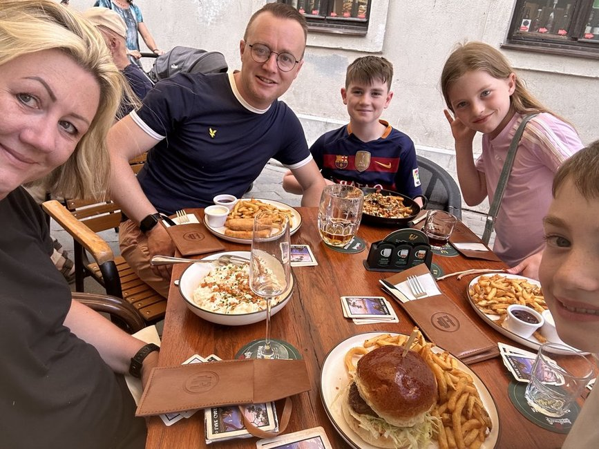 The Murtagh family take a selfie while eating traditional Slovakian cuisine in a restaurant in Bratislava
